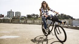 A female having fun on a bike